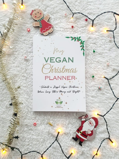 Foto van de Vegan Kerstplanner van The Vegan Saint voor een stressvrije kerst met een luxe 144 pagina volle planning van A tot Z.