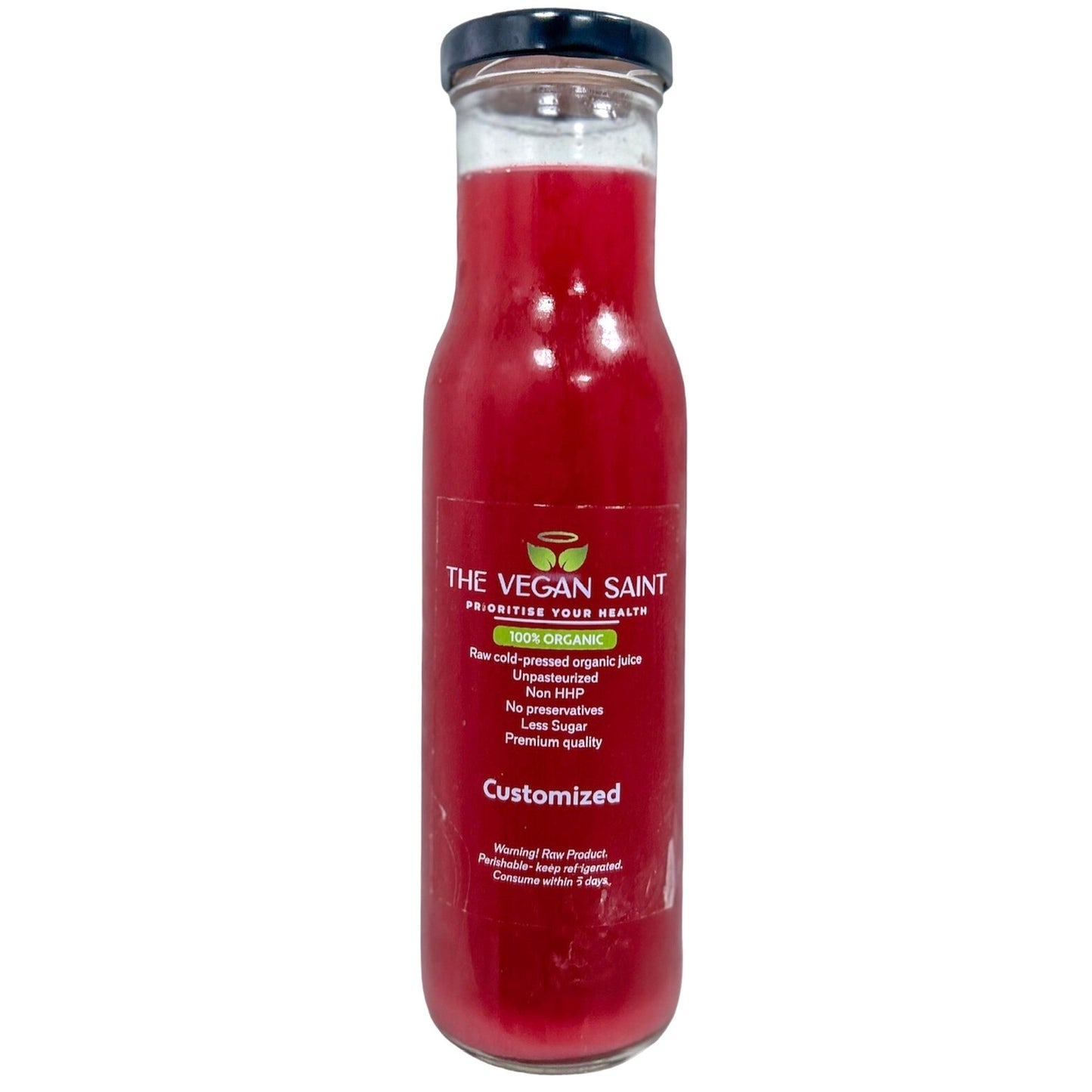 "Een flesje koudgeperst biologisch granaatappelsap van The Vegan Saint voor het herstel van de hormoonspiegel.
