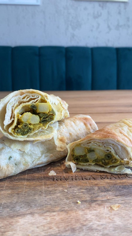 Vegan roti rol met aardappelen en kouseband